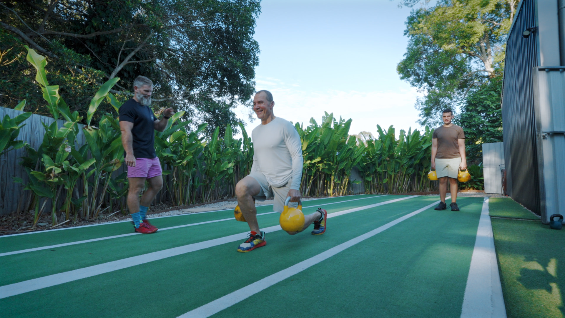 Kettlebell lunges in the outdoor training area